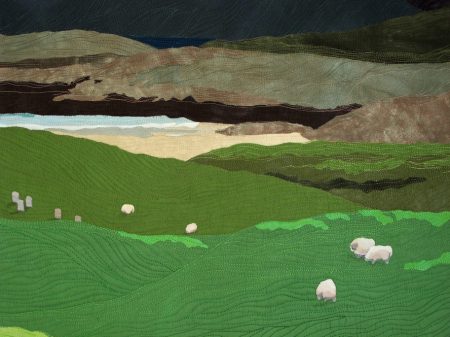 Collaged art quilt of graveyard and sheep overlooking Luskentyre Beach in Scotland