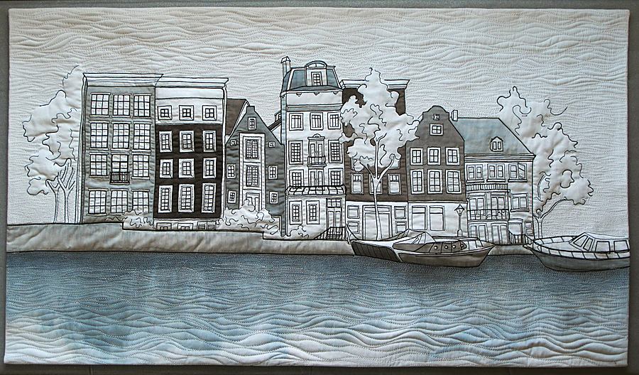 Thread sketched and painted art quilt of iconic houses in Amsterdam