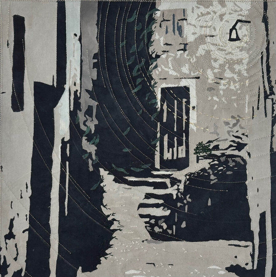 old stone pathway with door at night